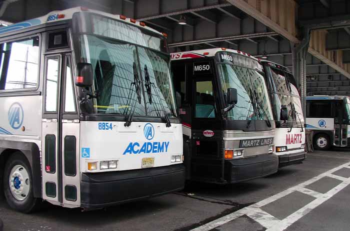 MCI coaches: Academy 8854 and Martz Trailways M650 & M250